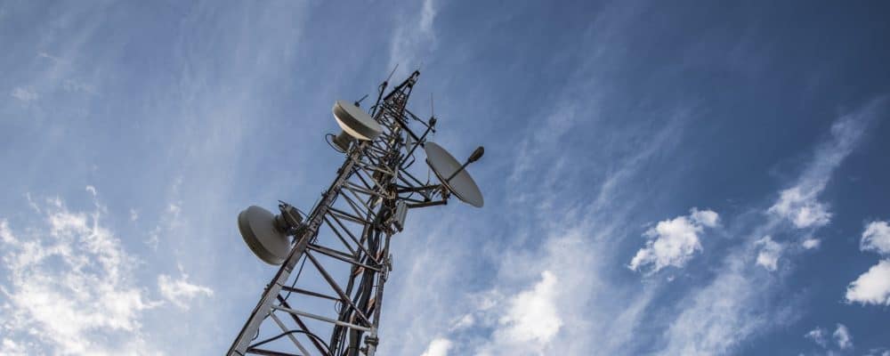 telecommunications tower with several dishes