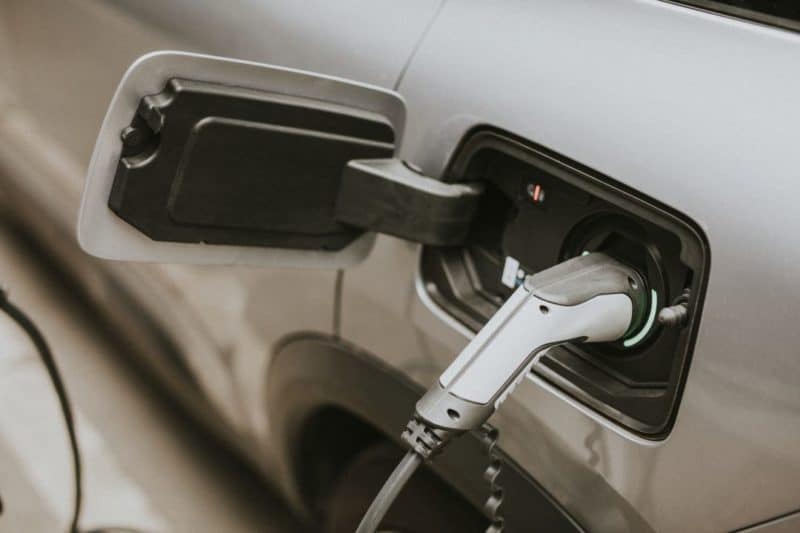 an EV charger plugged into a car, discounted by BC Hydro rebates