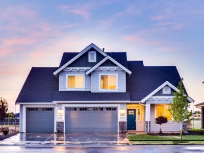 a home with the lights on powered by an upgraded breaker box