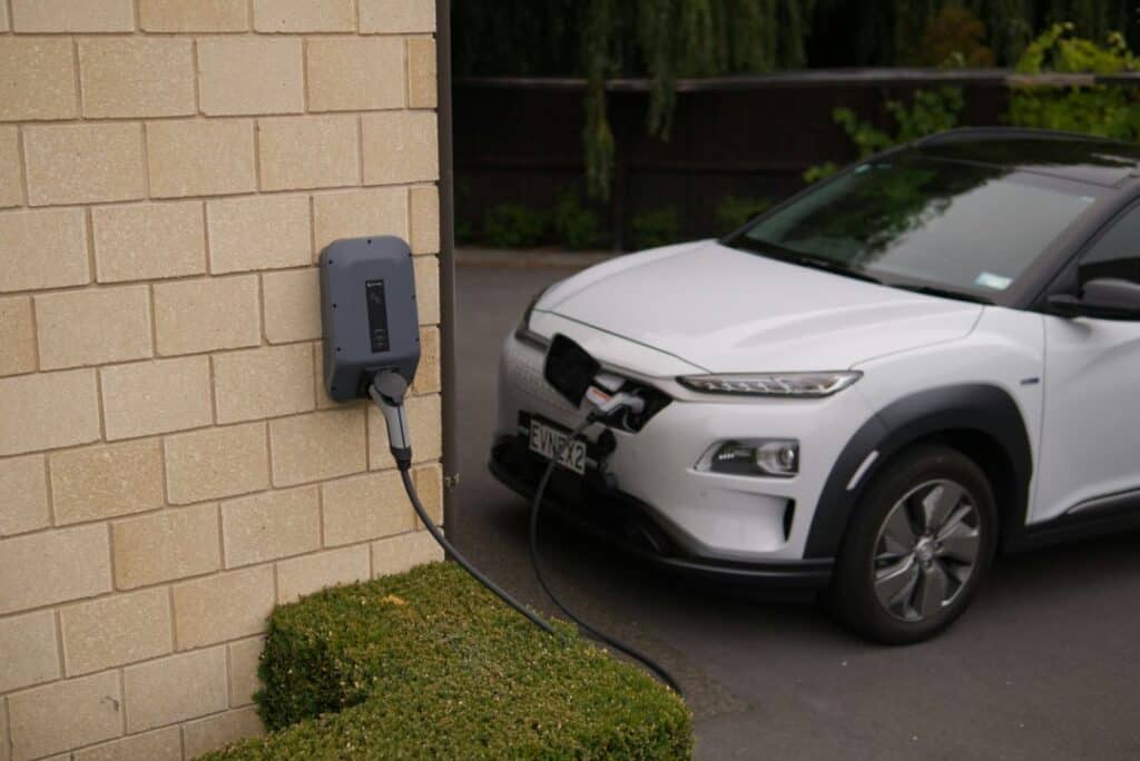an EV plugged into a smart EV charging station
