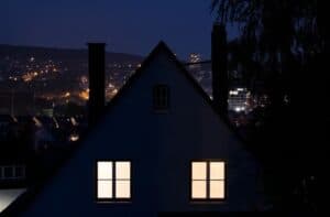 a home at night with lights on