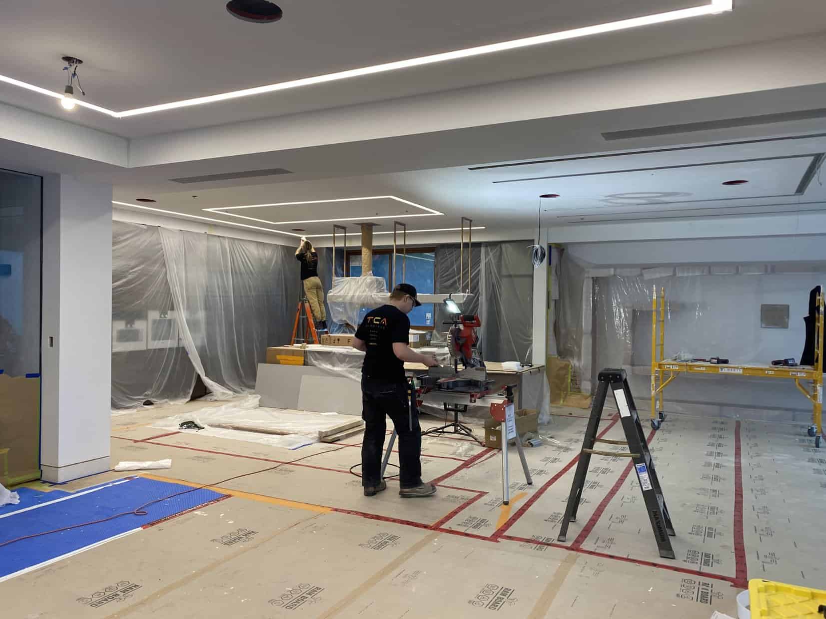 A TCA Electric staff in the process of lighting installation in Vancouver