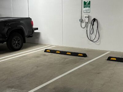 multi family ev chargers on wall in parking garage by TCA Electric in Vancouver, BC