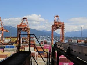 port of vancouver looking over shipping containers from a crane TCA Electric