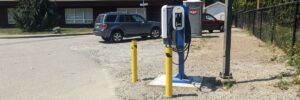 an electric vehicle charging station in a parking lot setting in Vancouver