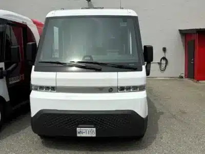 Fleet of electric commercial vans utilizing smart EV charging solutions after hours by TCA Electric
